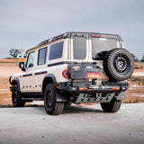 Off-road vehicle with large tires on a paved surface