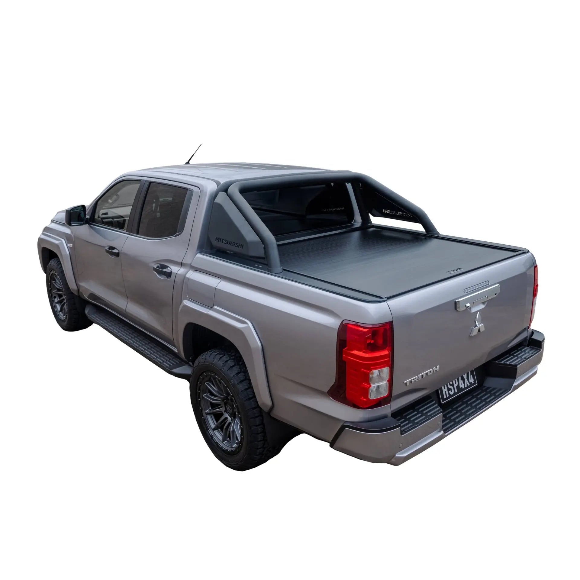 Gray pickup truck with a tonneau cover on a white background