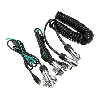 Gator GTK1 4-pin PROLINK II trailer camera connection kit laid out: two weatherproof sockets with threaded screw-together connectors on 2 metre leads, a 2 metre coiled curly cord with integrated reverse trigger wire, and two metal mounting brackets