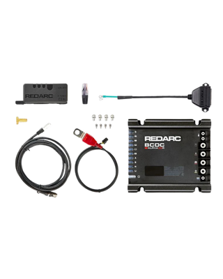 Everything in the Alpha50 R box laid out: the battery manager itself, the sense module, an RJ45 network lead, a battery lead with red ring terminal and in-line fuse, a green sense lead with ring terminal, four mounting screws, a brass terminal bolt and a spare RJ45 plug