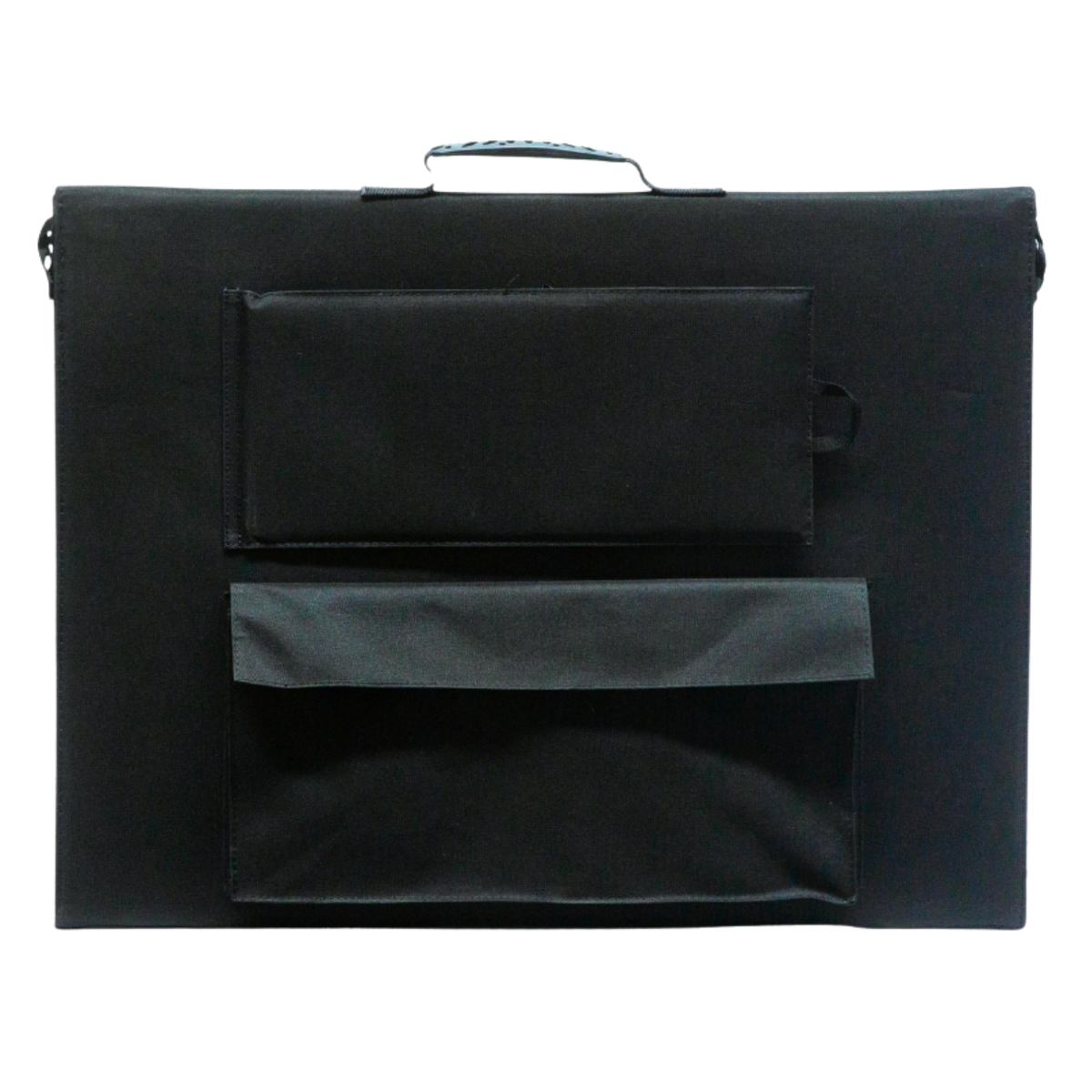 Back of the folded solar blanket, showing the carry handle, the shoulder strap anchors, the zipped cable pocket and the flap that covers it