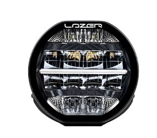 A black 7-inch Lazerlamps Sentinel LED driving light with a clear polycarbonate lens, designed for vehicles or tight mounting setups, featuring advanced LED technology.