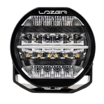 A black 7-inch Lazerlamps Sentinel LED driving light with a clear polycarbonate lens, designed for vehicles or tight mounting setups, featuring advanced LED technology.
