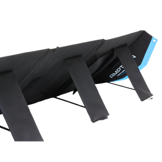 The folded solar blanket propped on its rear support legs, showing the padded backing panels and the strap that holds the legs at their working angle