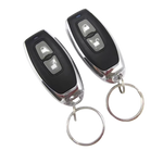 Two car remote keyfobs with keychains on a white background