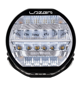 A black 7-inch Lazerlamps Sentinel LED driving light with a clear polycarbonate lens, designed for vehicles or tight mounting setups, featuring advanced LED technology.