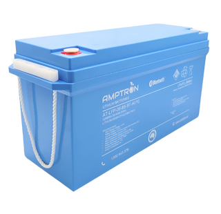 The same 36 volt 85Ah Amptron battery from the front corner with its rope carry handle lifted clear of the case, showing the depth of the housing and the recessed terminals