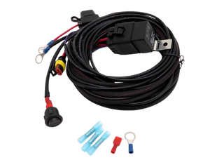 An assortment of Lazerlamps wiring kits including various connectors, cables, a relay, and fuses.