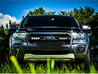 Ford Ranger with Lazer Lamps Grille Kit – Ford Ranger (2019–2022) in a grassy area with trees in the background