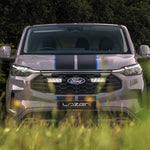 Ford vehicle with Lazer Lamps Grille Kit – Ford Transit Custom Sport (2024+) in a natural setting