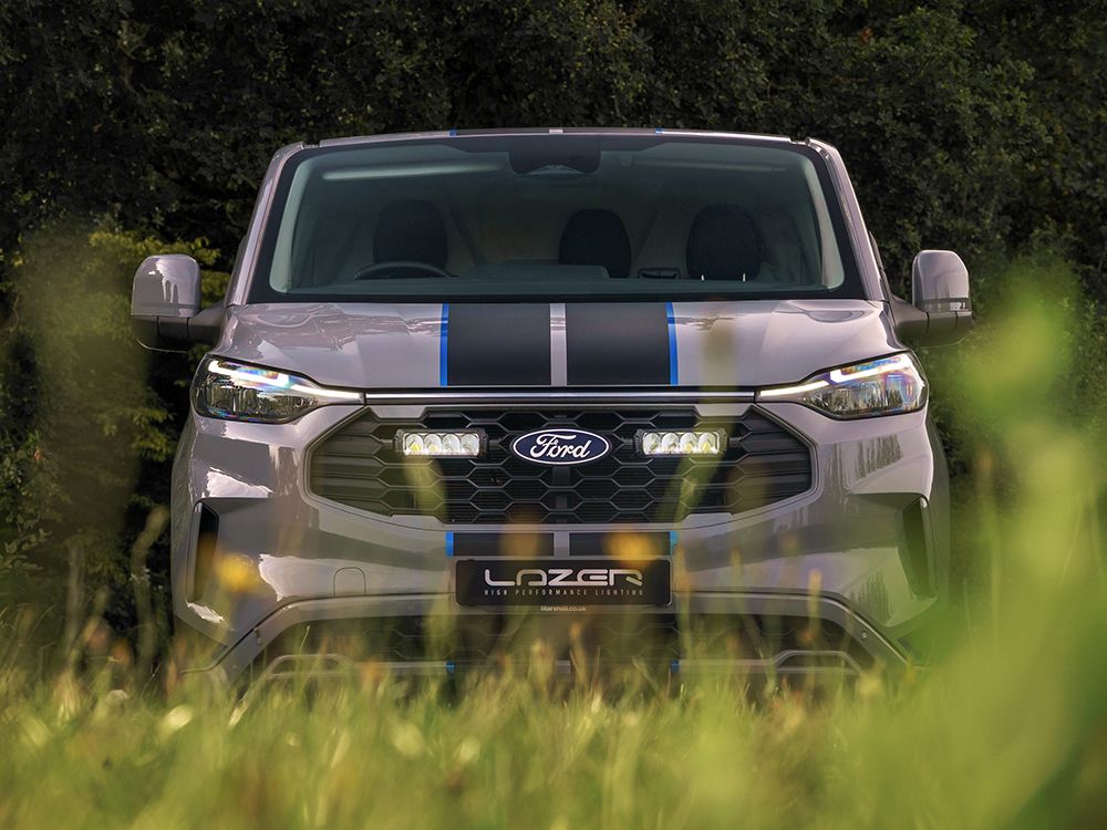 Ford vehicle with Lazer Lamps Grille Kit – Ford Transit Custom Sport (2024+) in a natural setting