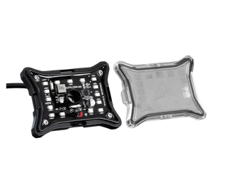 The rock light shown in two parts, the LED board in its black frame with the lead attached beside the clear lens cover that clips over it