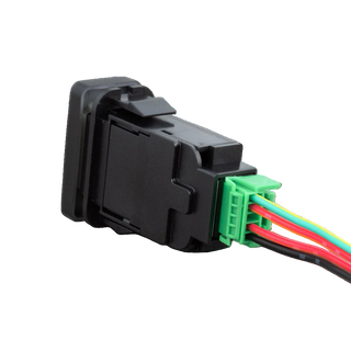 Black Toyota-fit switch seen from behind at an angle, the moulded body with its retaining tabs and a green connector carrying green, red, red and black wires