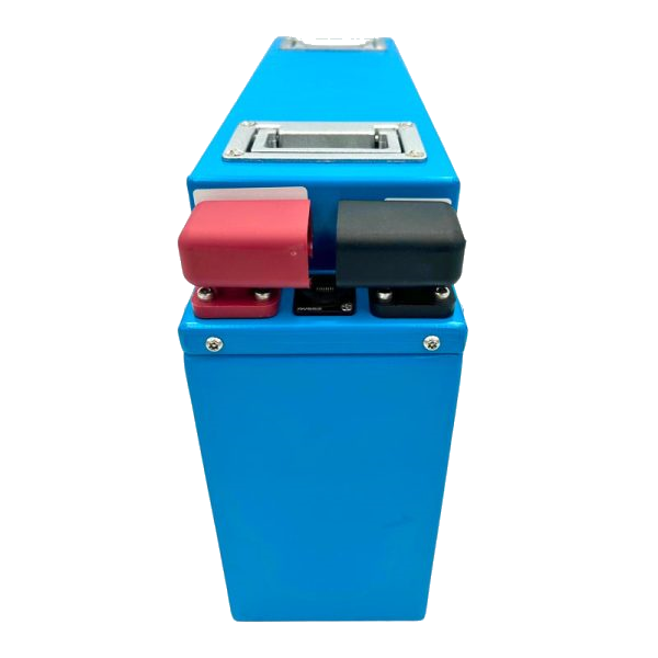 End view of the slimline battery, looking at the red positive and black negative terminal covers with the communication socket between them and the folded carry handle above
