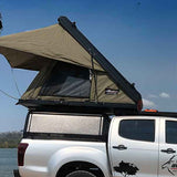Bush Company AX27 Clamshell Rooftop Tent side view on tray canopy