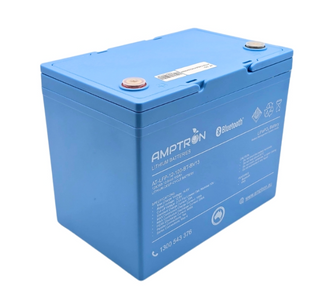 Amptron 12V 100Ah LiFePO4 battery in its blue case seen from the front corner, with the recessed terminals under their covers, the Bluetooth marking and the specification panel down the front face