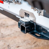 TCC hitch receiver on a vehicle with a blurred background