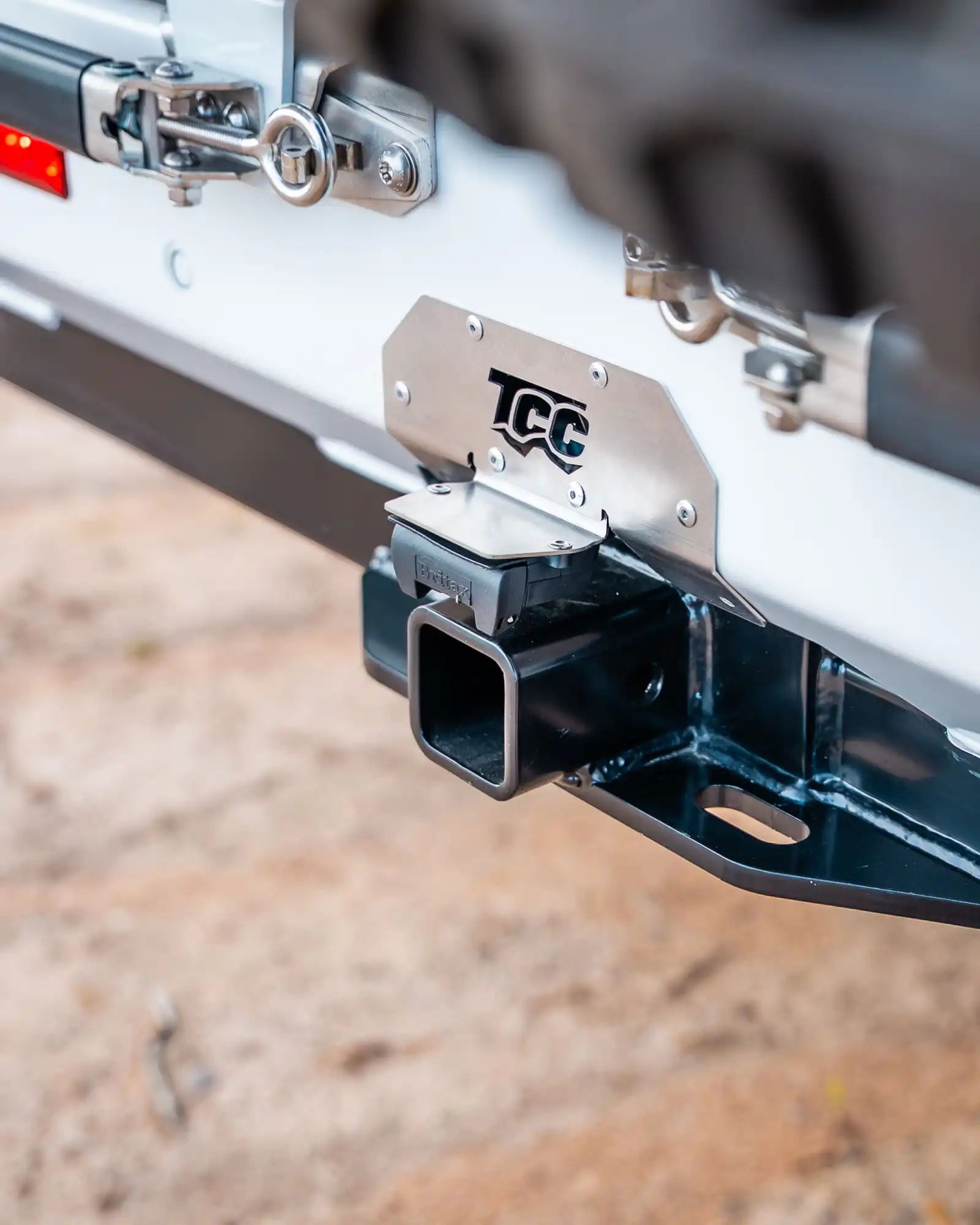 TCC hitch receiver on a vehicle with a blurred background