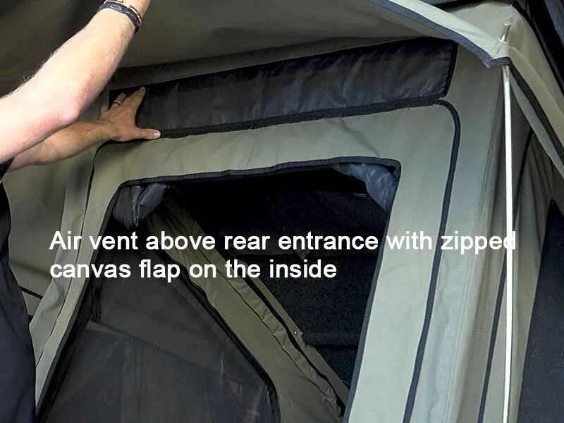 Air vent above rear entrance with zipped canvas flap on a tent