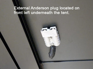 External Anderson plug on a tent with text indicating its location.