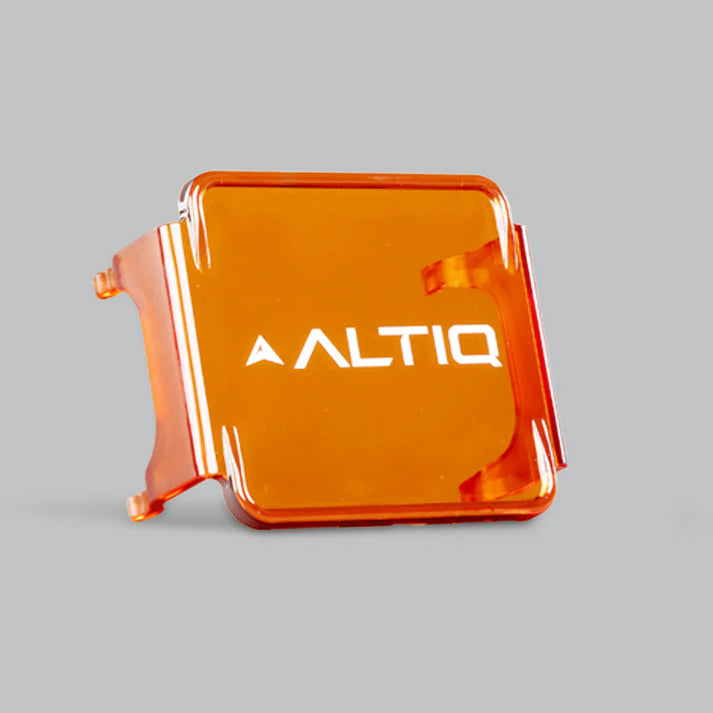 Amber DX4 lens cover at a three-quarter angle, the ALTIQ name across the face and the side skirts that wrap the light housing