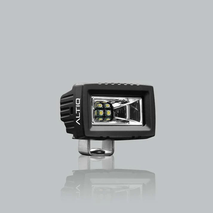ALTIQ CX2 work light face on, the ALTIQ name on the left cheek of the housing and the rectangular reflector with its LED cluster and clear lens