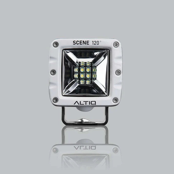 White DX4 Scene work light face on, the bezel marked SCENE 120 degrees above the square reflector and its nine LEDs, with the ALTIQ name below