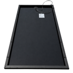 Black rectangular solar panel with a wire on a white background