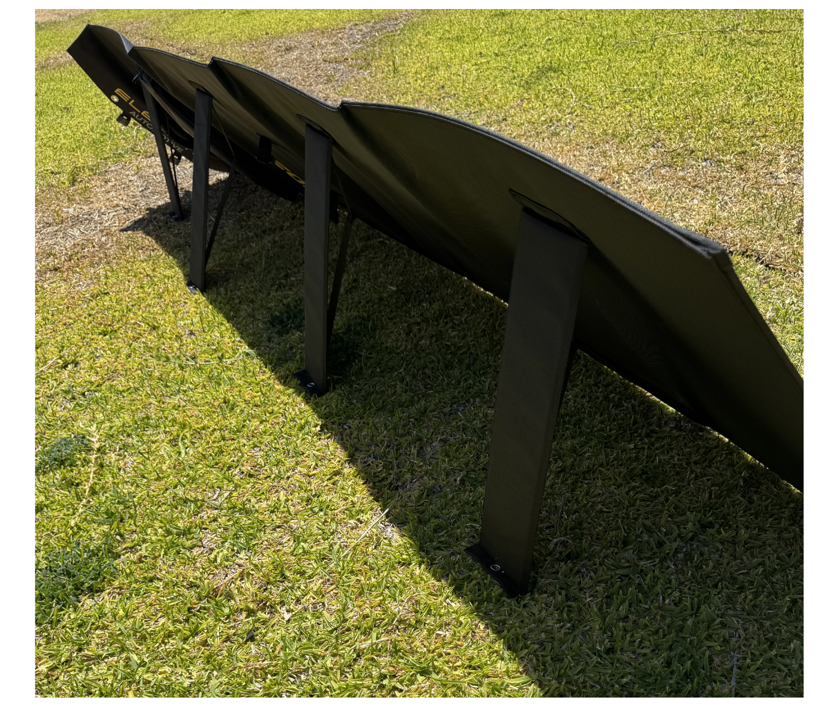 Foldable solar panel on a grassy background