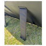 Leg support on grass with a white background
