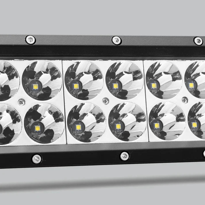 Close-up across the spot section of the double row bar, two rows of LEDs each seated in a deep polished reflector behind the lens