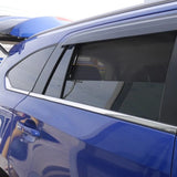 Blue car with a roof rack in a parking lot