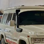 White off-road vehicle with red graphics on a white background