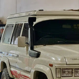 White off-road vehicle with red graphics on a white background