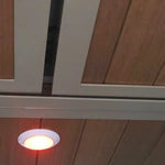 Ceiling light fixture with wooden paneling