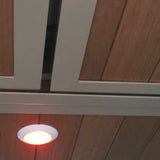 Ceiling light fixture with wooden paneling