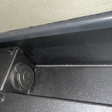Close-up of a car door panel with a focus on the edge and trim.