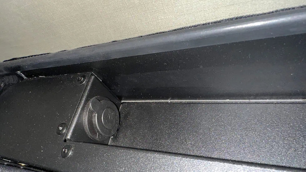 Close-up of a car door panel with a focus on the edge and trim.