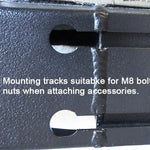 Close-up of a black metal bracket with mounting tracks for M8 bolts or nuts.