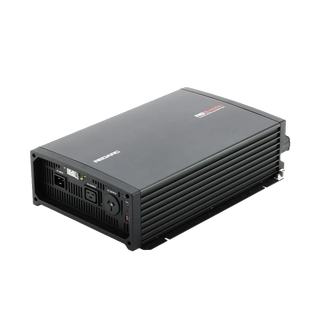 REDARC RS3 3000W inverter at an angle, showing the finned black aluminium housing and the AC panel on the front face