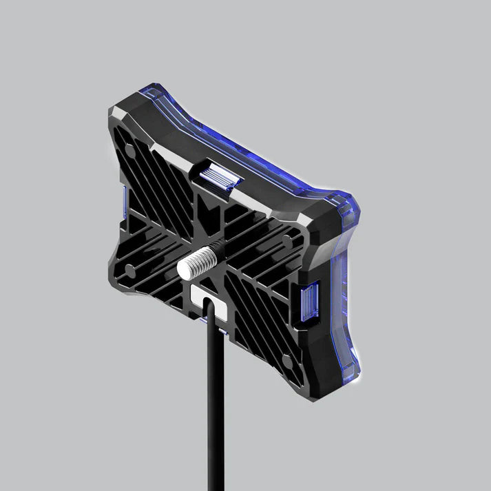 Rear of a rock light with a blue cover fitted, showing the finned cast heatsink, the threaded mounting stud and the blue light spilling around the edges