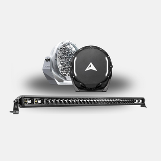 The kit shown together: a white and a black ALTIQ round driving light behind, with a long single-row hybrid light bar in front
