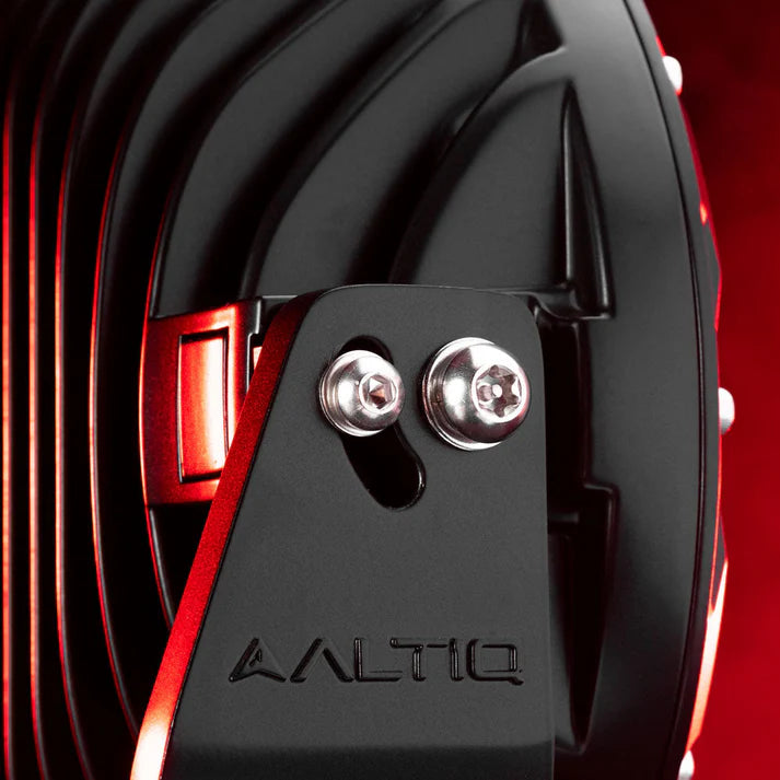 Close-up of the Rogue mounting bracket lit in red, showing the two stainless socket bolts through the slotted adjustment hole and the ALTIQ name moulded into the bracket face