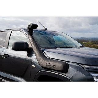Car with a SAFARI V-SPEC SNORKEL against a cloudy sky