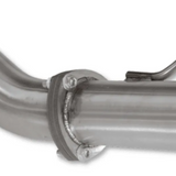 Close-up of a metal exhaust pipe with a clamp on a white background
