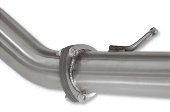 Close-up of a metal exhaust pipe with a clamp on a white background