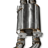 Metallic exhaust system on a white background