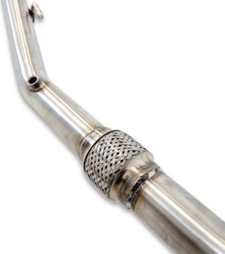Close-up of a metallic exhaust pipe with a textured end cap on a white background