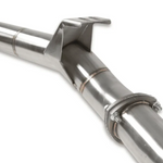 Close-up of a metallic exhaust pipe with a white background