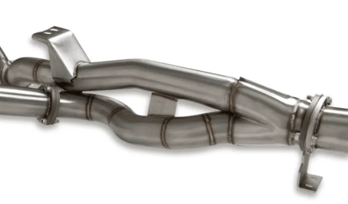 Metallic exhaust pipe system on a white background